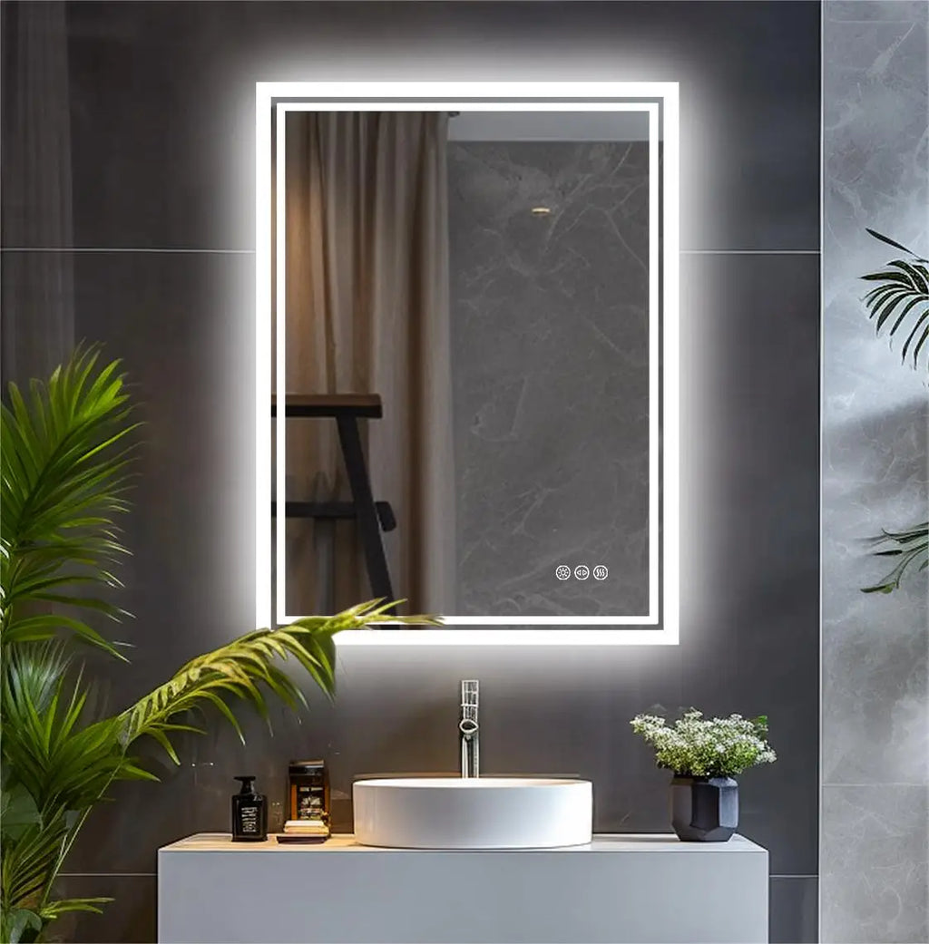 Le Studio, miroir LED rectangulaire sans cadre, allumé au-dessus d'une vasque à poser