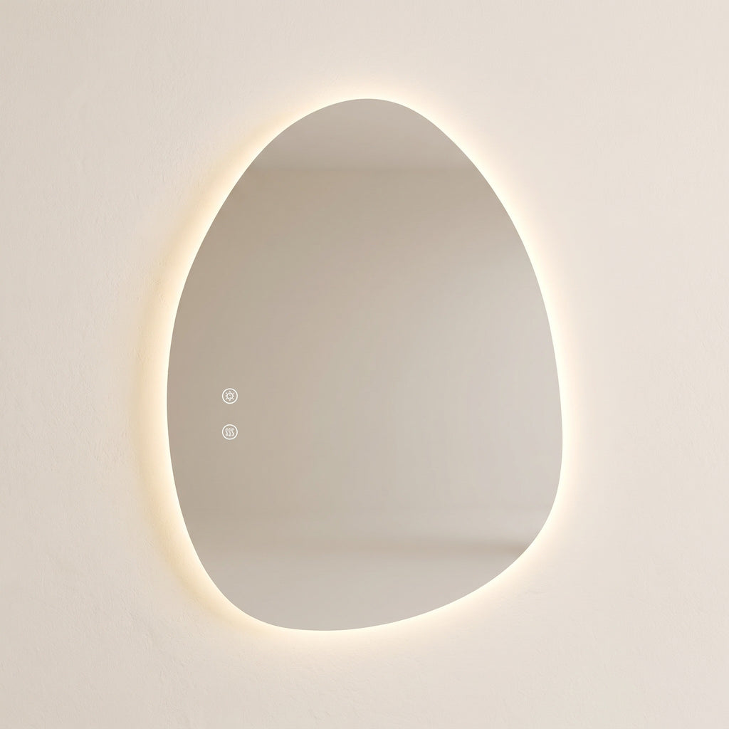 Le Galet, miroir LED en forme de galet, vue de face sur fond ivoire